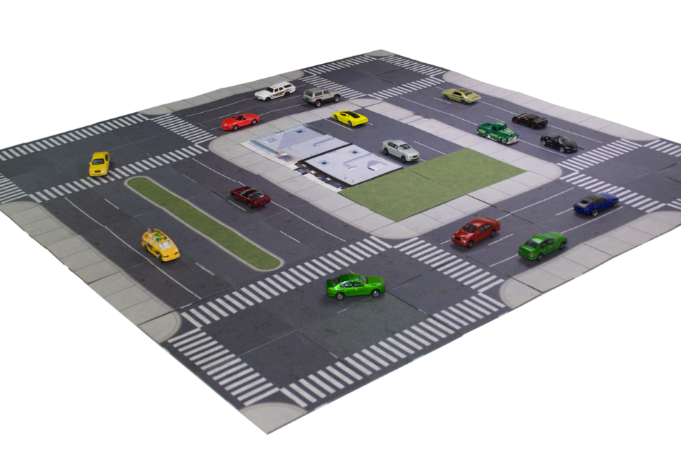 Topoda tiles assembled with die-cast cars